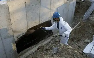 Professional waterproofing the exterior walls of the basement in ,