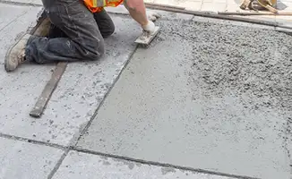 Professional repairing a concrete floor in ,