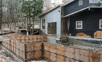Prepared site with foundation forms for home remodeling and addition project in ,
